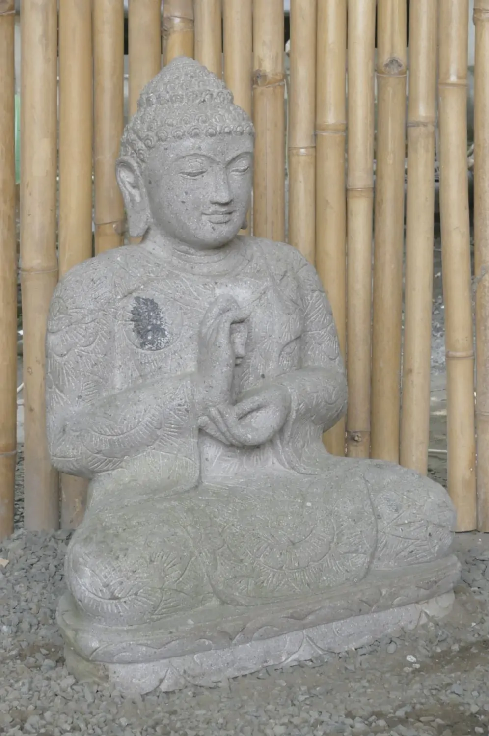  Product image 3 of the product “Seated Buddha with floral carving, Dharmacakra position. 67 cm height. Natural stone (river stone), stonemasonry. There is a stone eye in the chest. ”